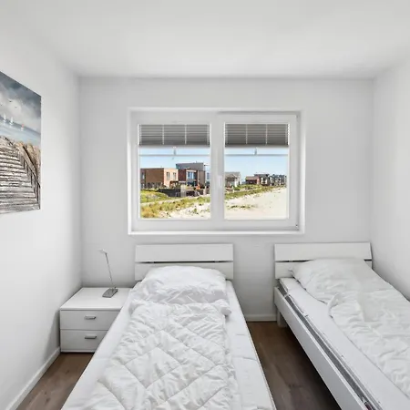 Semesterbostad Weisse Strandvilla 61d