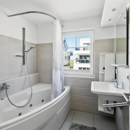 Semesterbostad Weisse Strandvilla 61d *